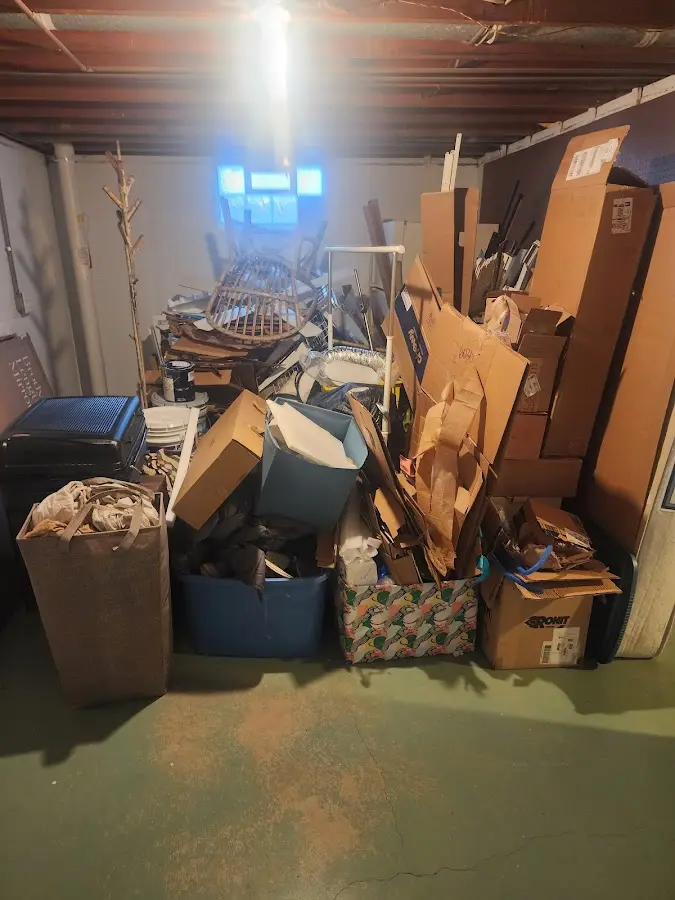 Roll-off dumpster container at job site for 8 Yard Dumpster Rental in Indianola